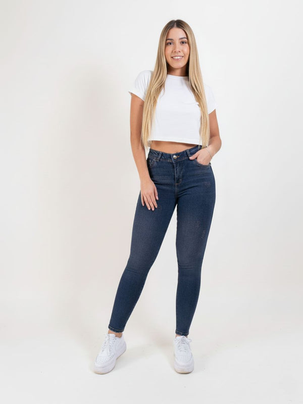 Jeans Skinny Americano Azul Oscuro Matizado con Desgastes